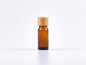 Preview: Braunglasflasche 10ml, mit Tropfmontur Bambus