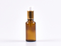 Preview: lotionsflasche-braunglas-pumpe-gold-30ml