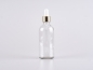 Preview: Klarglasflasche 100ml, mit Pipette gold