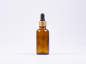 Preview: Braunglasflasche 50ml, mit Pipette gold