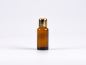 Preview: Braunglasflasche 20ml, mit Tropfmontur Gold