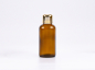 Preview: Braunglasflasche 50ml, mit Tropfmontur Gold
