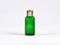 Preview: Grünglasflasche 30ml, mit Tropfmontur Gold