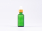 Preview: Grünglasflasche 50ml, mit Lotionspumpe Bambus