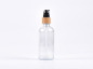 Preview: Klarglasflasche 100ml, mit Lotionspumpe Bambus