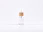 Preview: Klarglasflasche 10ml, mit Lotionspumpe Bambus