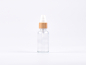 Preview: Klarglasflasche 30ml, mit Lotionspumpe Bambus