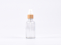 Preview: Klarglasflasche 50ml, mit Lotionspumpe Bambus