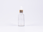 Preview: Klarglasflasche 50ml, mit Pipette gold
