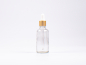 Preview: Klarglasflasche 50ml, mit Pipette gold