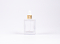 Preview: Klarglasflasche "Miro" 50ml, mit Pipette gold