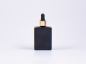 Preview: Schwarzglasflasche "Miro" 50ml, mit Pipette gold