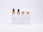 Preview: Klarglasflasche "Miro" 50ml, mit Pipette gold