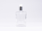 Preview: Klarglasflasche "Miro" 100ml, mit Lotionspumpe Aluminium, 4 Color
