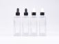 Preview: Klarglasflasche "Miro" 100ml, mit Pipette schwarz