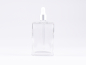 Preview: Klarglasflasche "Miro" 100ml, mit Pipette silber matt