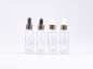 Preview: Klarglasflasche "Miro" 50ml, mit Pipette gold