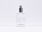 Preview: Klarglasflasche "Miro" 50ml, mit Zerstäuber Aluminium, 4 Color