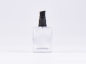 Preview: Klarglasflasche "Miro" 50ml, mit Lotionspumpe Kunststoff