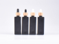 Preview: Schwarzglasflasche "Miro" 100ml, mit Pipette Bambus