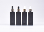 Preview: Schwarzglasflasche "Miro" 100ml, mit Pipette gold