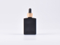 Preview: Schwarzglasflasche "Miro" 50ml, mit Pipette Bambus