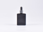 Preview: Schwarzglasflasche "Miro" 50ml, mit Pipette silber glanz