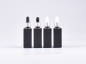 Preview: Schwarzglasflasche "Miro" 50ml, mit Pipette silber matt