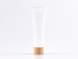 Preview: Kosmetiktube 100ml, transparent, mit Deckel Bambus