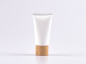 Preview: Kosmetiktube 50ml, weiss-matt, mit Deckel Bambus