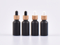 Preview: Schwarzglasflasche 10ml, mit Pipette Bambus