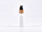 Preview: Weissglasflasche 30ml, mit Lotionspumpe Bambus