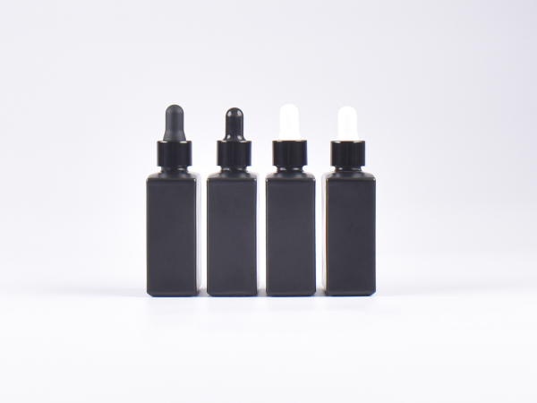 Schwarzglasflasche "Miro" 50ml, mit Pipette schwarz