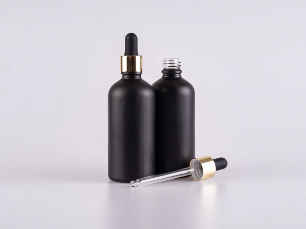 Schwarzglasflasche 100ml, mit Pipette gold