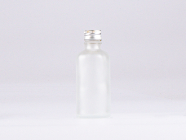 kosmetikflasche-glas-schwarzmatt-golddeckel