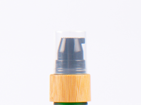 Grünglasflasche 100ml, mit Lotionspumpe Bambus
