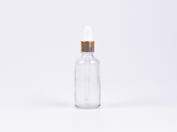Klarglasflasche 50ml, mit Pipette gold