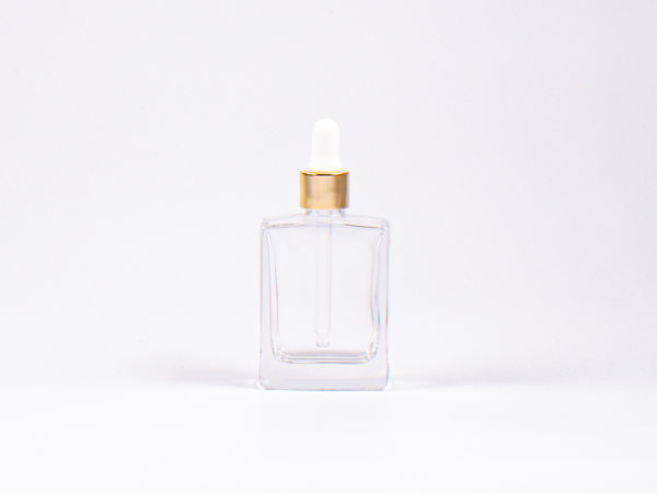 Klarglasflasche "Miro" 50ml, mit Pipette gold