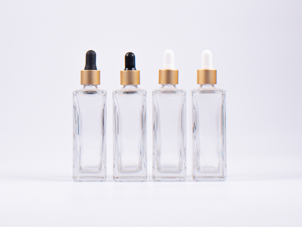 Klarglasflasche Miro 100 ml - Pipette gold