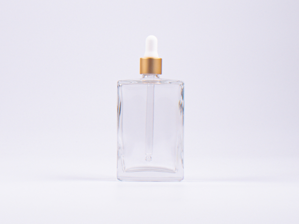 Klarglasflasche Miro 100 ml - Pipette gold