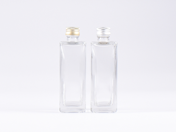 Klarglasflasche "Miro" 100ml, mit Schraubverschluss Aluminium