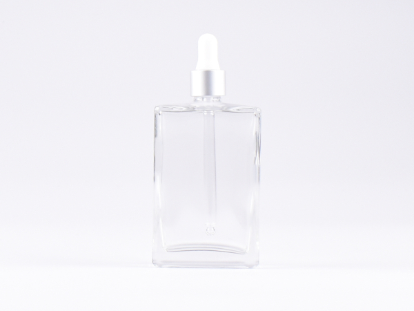 Klarglasflasche "Miro" 100ml, mit Pipette silber matt