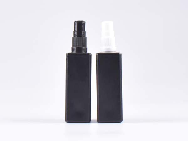 Schwarzglasflasche "Miro" 100ml, mit Lotionspumpe Kunststoff