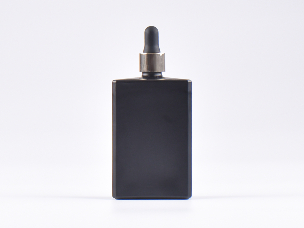 Schwarzglasflasche "Miro" 100ml, mit Pipette gold