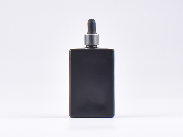 Schwarzglasflasche "Miro" 100ml, mit Pipette silber glanz