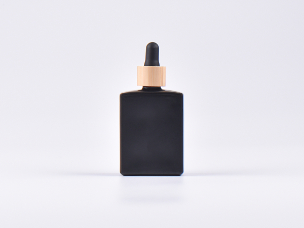 Schwarzglasflasche "Miro" 50ml, mit Pipette Bambus