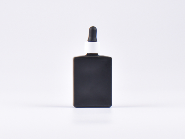 Schwarzglasflasche "Miro" 50ml, mit Pipette weiss