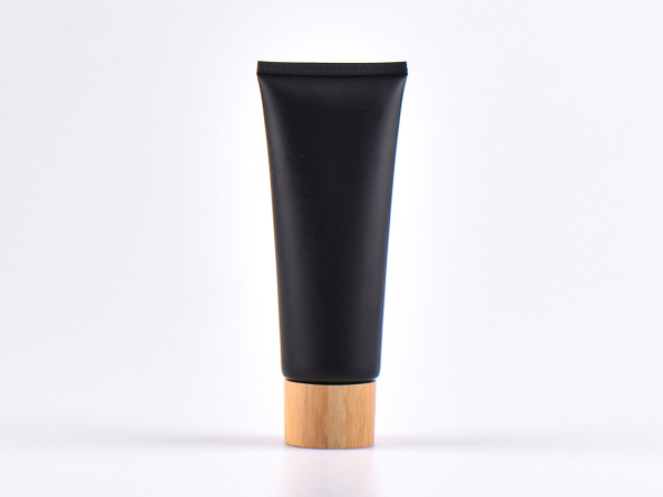 Kosmetiktube 100ml, schwarz-matt, mit Deckel Bambus