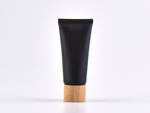 Kosmetiktube 60ml, schwarz-matt, mit Deckel Bambus