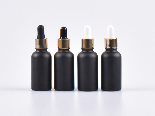 Schwarzglasflasche 100ml, mit Pipette gold